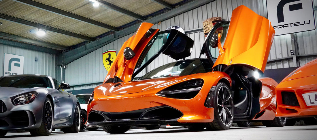 Specialist supercar detailing on a McLaren and Lamborghini at FX Detailing Surrey. Investment-grade paint correction and ceramic coating in our Charlwood studio.