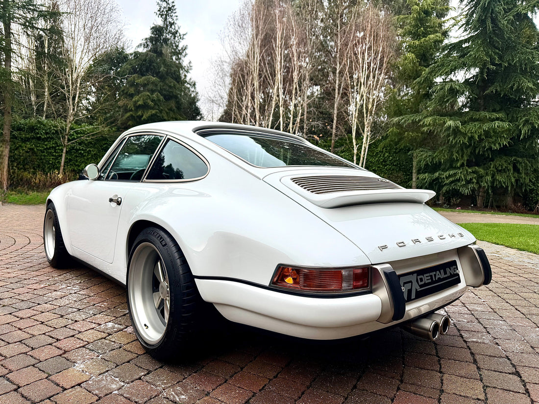 Singer Porsche 911 restoration and paint correction by FX Detailing. Total vehicle reset featuring deep-cleaned wheel arches, polished exhaust tips, and ceramic protection in Surrey.