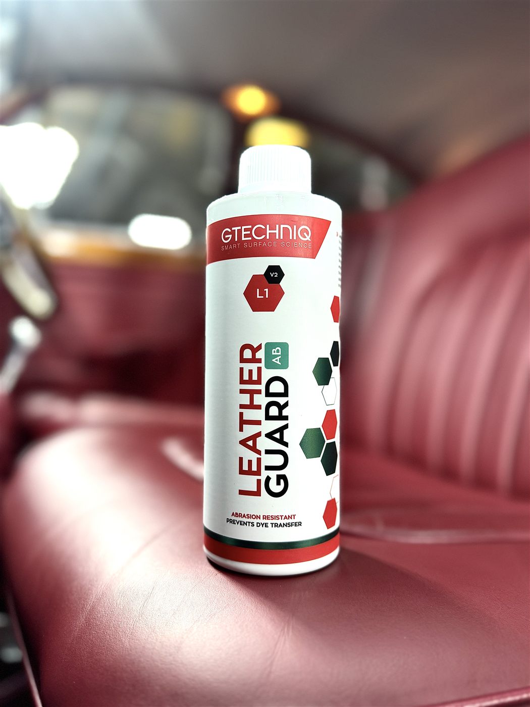 Gtechniq L1 Leather Guard bottle on red leather